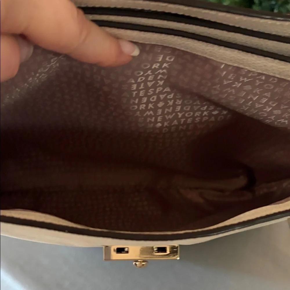 Kate Spade New York leather women’s Natacha Lovett street ivory satchel.
